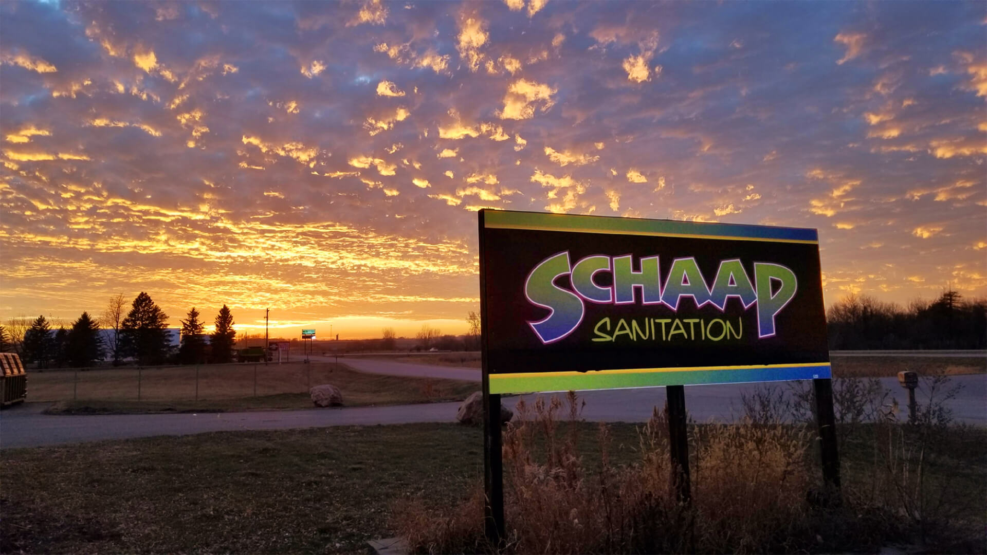 Schaap Sanitation sign at sunset